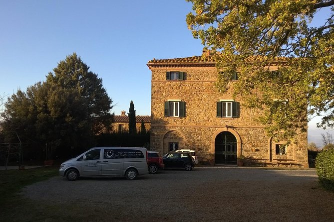 Brunello Vineyards Bus Tour - Stop 1 in Montalcino: vineyard walk, cellar tour, then tasting