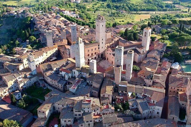 Chianti, San Gimignano and Siena Full Day Trip with Wine Tastings - San Gimignano’s towers, UNESCO status, and walk-up payoff