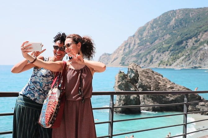 Cinque Terre Day Trip from Florence: Guided Round-Trip Bus - Riomaggiore: colorful harbor energy and quick photo wins