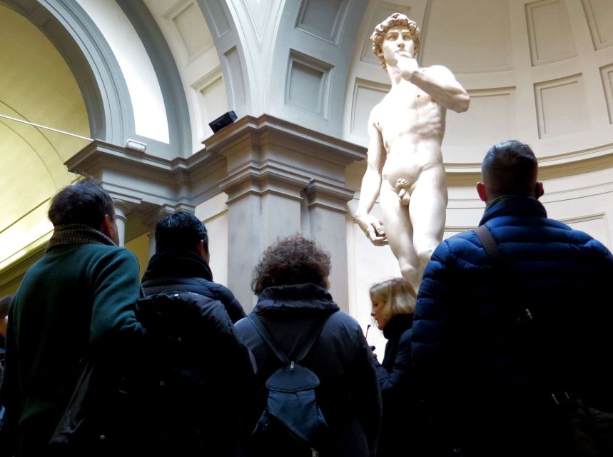 Florence: Accademia Gallery & Duomo Guided Tour - Inside Santa Maria del Fiore: marble choir, glass, and Uccello’s clock