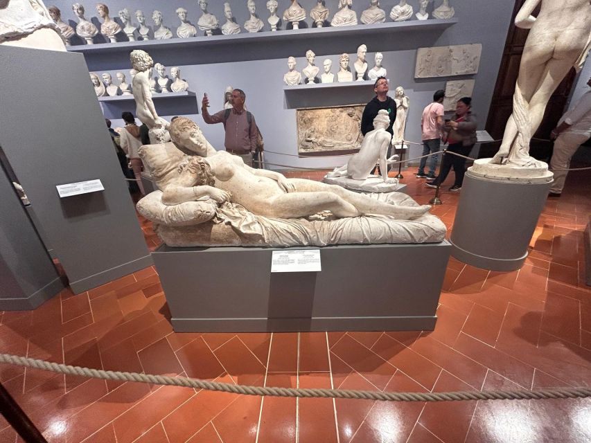 Florence: Accademia Reserved Entrance Ticket and Guided Tour - Finding your guide at Carrefour Express and staying on schedule