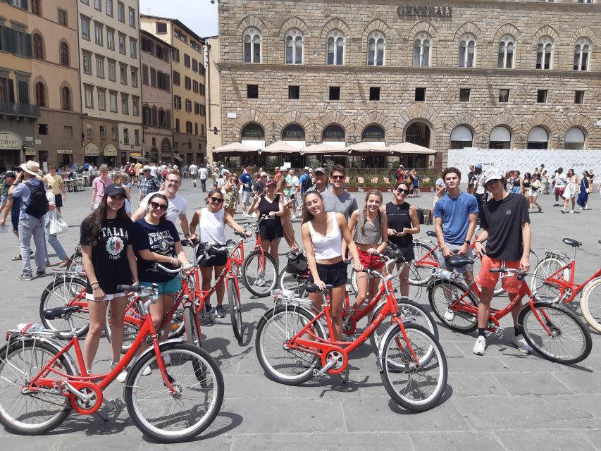 Florence: City Highlights Bike Tour - Piazza della Signoria: statues up close and that lion-weather detail