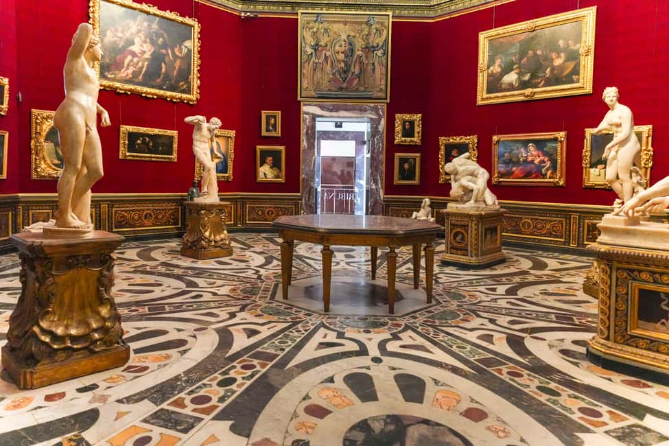 Florence: Fast Track Uffizi Gallery Guided Tour - Meeting point logistics: Leonardo da Vinci statue and the white flag