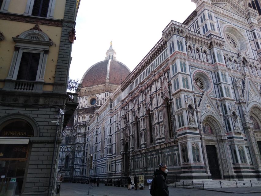 Florence: LGBTQ Renaissance Walking Tour with Mila - Crossing Santa Trinita Bridge toward the Medici square