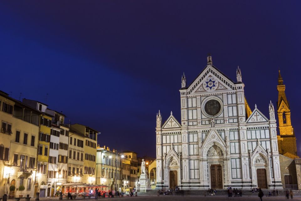 Florence: Night Tour by Electric Bike - Santa Croce at night: a Franciscan stop with weight