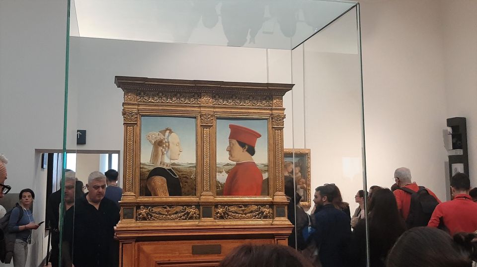 Florence: Private City Walking Tour with Accademia & Uffizi - Mercato della Paglia: A Quirky Break With a Real Sculpture Detail