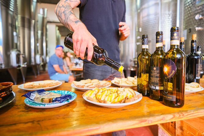 Half-day Experience to San Gimignano Hills with Picnic and Wine - Winery stops: Poggio Amorelli stands out, but the second stop can vary