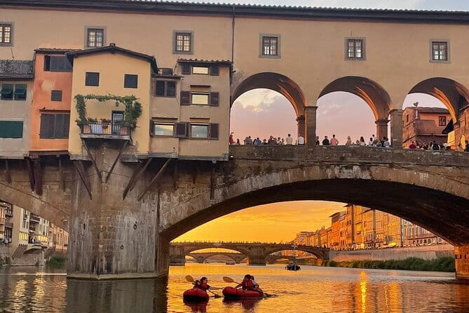 Kayaking on the Arno River in Florence under the Pontevecchio Arcade - Why Paddling the Arno Beats Walking Florence
