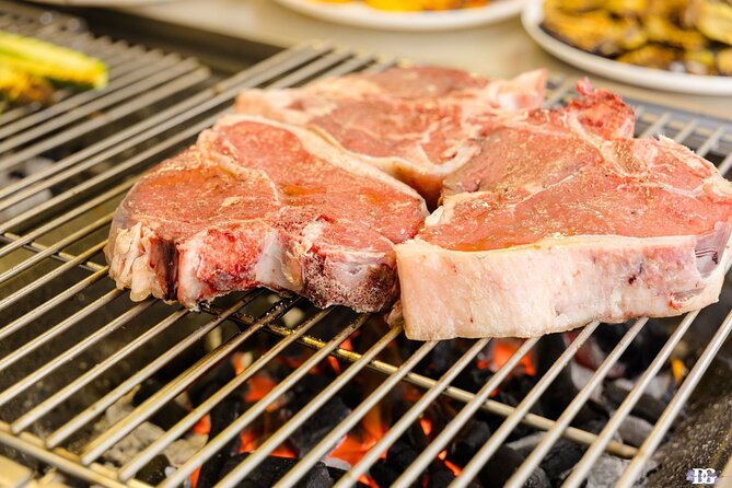 Master the Art of Florentine Steak: A Unique Cooking Experience! - Drinking and eating: unlimited wine plus measured structure