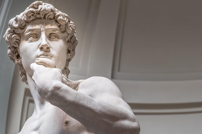 Private Full Day Walking Tour of Florence Highlights with Uffizi and Accademia - Romanesque Baptistery, Medici Power, and the Duomo-Adjacent Stops