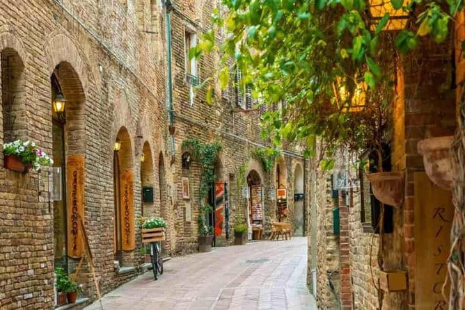 Private Tour to Siena and Montalcino from Florence - Florence pickup, luxury minivan comfort, and driver-led context