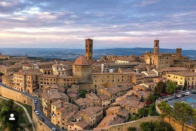 San Gimignano and Volterra Tour by Private Luxury Van - Volterra’s older layers: Etruscan tombs, Roman baths, and a stone theater