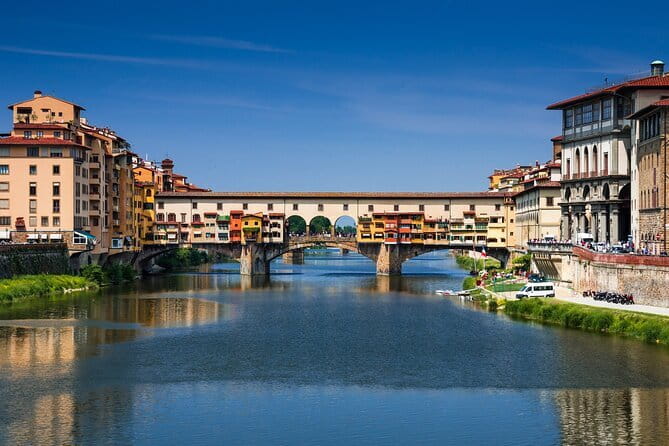Sightseeing Guided Tour of Florence by Night including Duomo & Palazzo Vecchio - Ponte Vecchio at night: jewelry shops and river views in motion