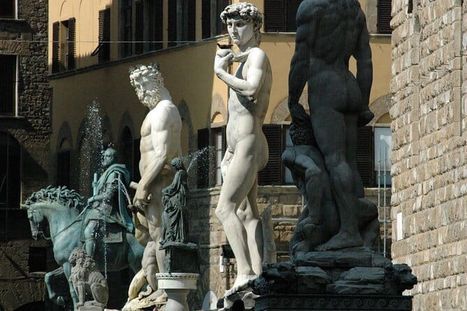 Walking tour of Florence with a private Florentine Tourist Guide - Piazza della Signoria: where Dante hangs around in the streets